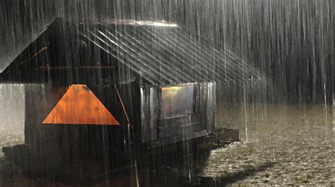 Rain sounds. . Heavy rain on tin roof for sleeping
